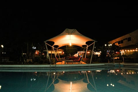 Outdoor pool, open 6:00 AM to 6:00 PM, pool umbrellas, sun loungers