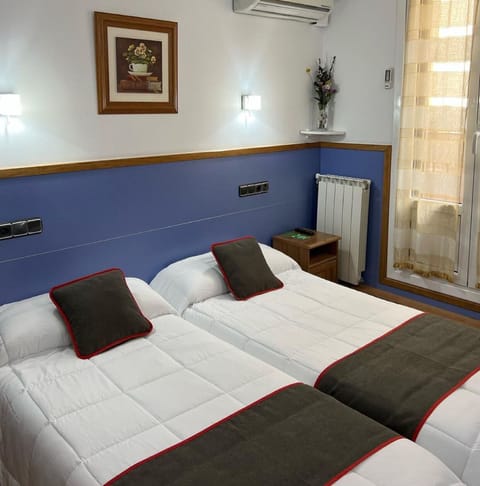 Double or Twin Room | Blackout drapes, iron/ironing board, free WiFi, bed sheets