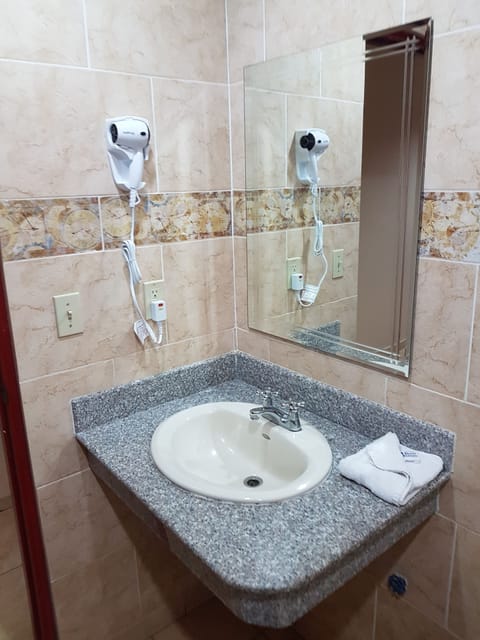 Standard Double Room, 1 Double Bed | Bathroom | Shower, hair dryer, towels