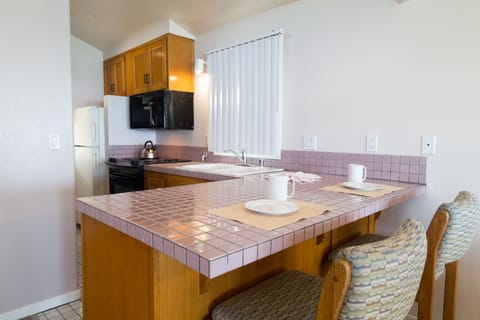 Condo, 2 Bedrooms, Non Smoking, Kitchenette | Private kitchen | Full-size fridge, microwave, oven, stovetop