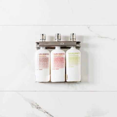 Shower, rainfall showerhead, designer toiletries, hair dryer