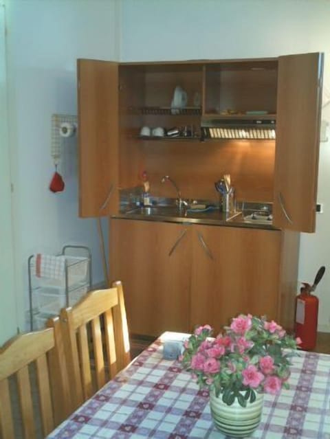 Studio | Private kitchen | Full-size fridge, highchair, cookware/dishes/utensils, cleaning supplies