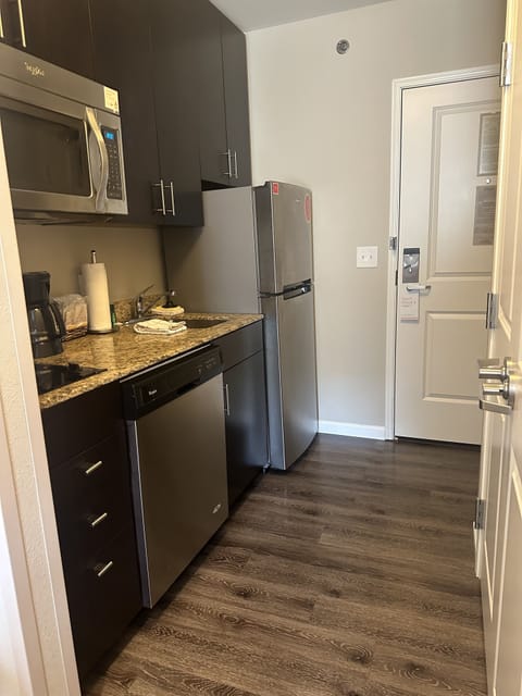 Studio, 1 King Bed with Sofa bed (Hearing Accessible) | Private kitchen | Fridge, microwave, stovetop, dishwasher