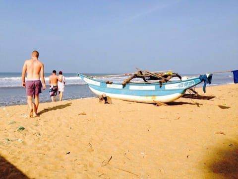 On the beach, 3 beach bars, surfing