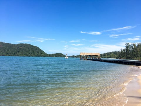 Private beach, beach umbrellas, beach towels, beach volleyball