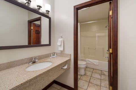 Standard Room, 2 Queen Beds, Non Smoking | Bathroom | Combined shower/tub, deep soaking tub, hydromassage showerhead