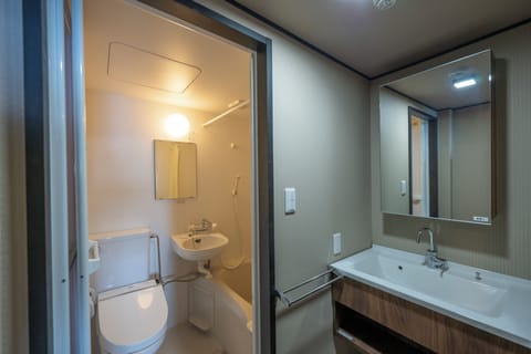 OCEAN Japanese-style Twin room (Non-smoking) | Bathroom | Combined shower/tub, deep soaking tub, slippers, electronic bidet