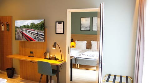 Large Family Sleeper/Two Bedrooms | Down comforters, desk, laptop workspace, blackout drapes