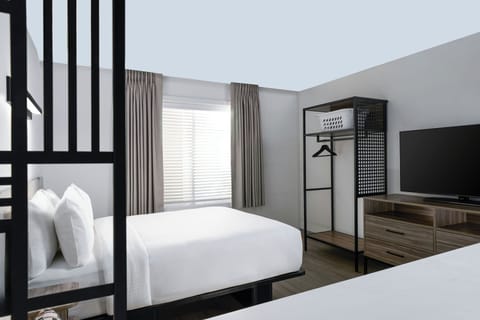 Studio, 1 Queen Bed, City View | Down comforters, desk, laptop workspace, blackout drapes