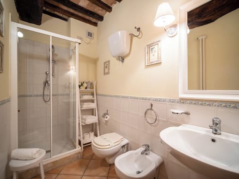 Apartment, 1 Bedroom, Poolside | Bathroom | Shower, free toiletries, hair dryer, bidet