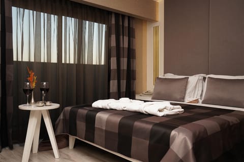 Family Suite, 2 Bedrooms | Frette Italian sheets, premium bedding, down comforters, minibar