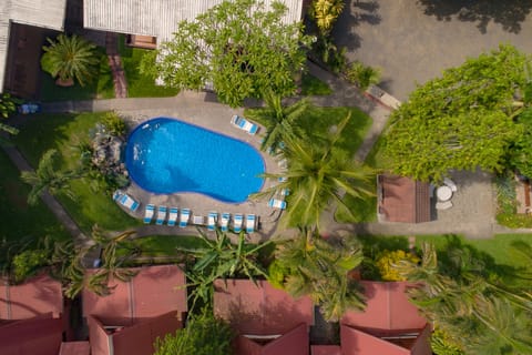 Outdoor pool, open 7:00 AM to 10:00 PM, sun loungers