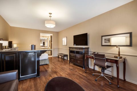 Suite, 1 King Bed, Smoking (with Sofabed) | Desk, iron/ironing board, free wired internet, bed sheets