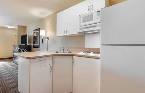 Studio, 1 King Bed, Non Smoking | Private kitchen | Full-size fridge, microwave, stovetop