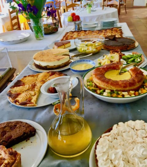 Lunch, dinner served; French cuisine, pool views