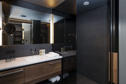 Shower, designer toiletries, bathrobes, slippers