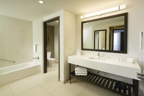 Suite, 1 King Bed with Sofa bed, Non Smoking | Bathroom | Shower, free toiletries, hair dryer, towels