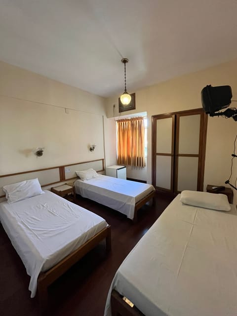 Standard Triple Room | Hypo-allergenic bedding, minibar, desk, free WiFi