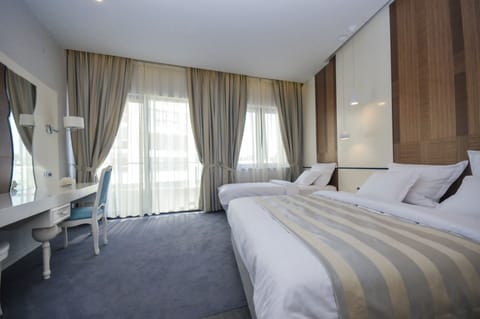 Suite, Balcony, Sea View | Minibar, in-room safe, desk, soundproofing