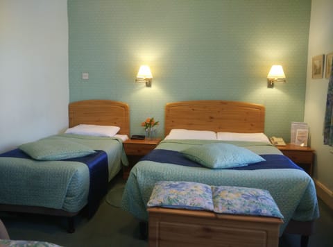 Family Room, Multiple Beds, Ensuite | Desk, iron/ironing board, free WiFi, bed sheets