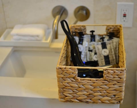 Rainfall showerhead, designer toiletries, hair dryer, towels