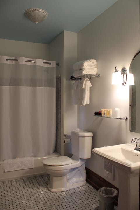 Combined shower/tub, designer toiletries, hair dryer, bathrobes