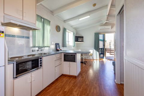 Superior Cabin | Private kitchen | Full-size fridge, microwave, oven, stovetop