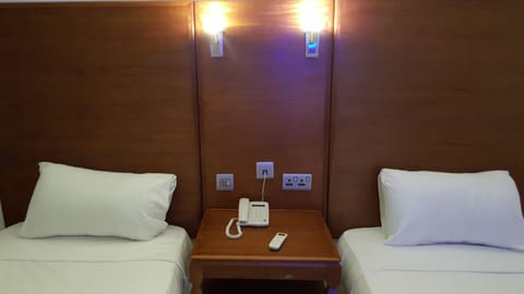 Twin Room | Minibar, in-room safe, desk, free WiFi