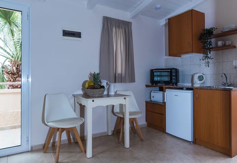 Standard Twin (Double) Studio with Garden View | Private kitchenette | Mini-fridge, oven, stovetop, electric kettle