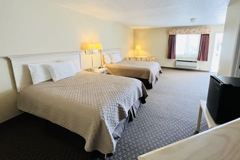 Deluxe Room, 2 Queen Beds, Patio, Courtyard Area | Premium bedding, desk, iron/ironing board, free WiFi