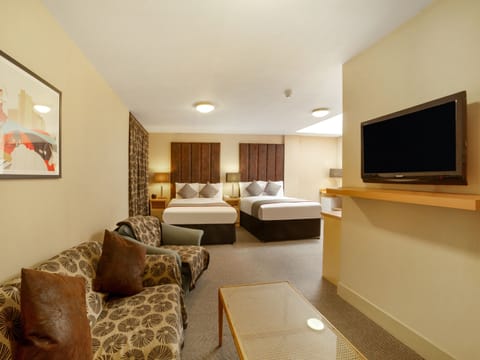 Deluxe Quadruple Room | 1 bedroom, desk, iron/ironing board, free cribs/infant beds