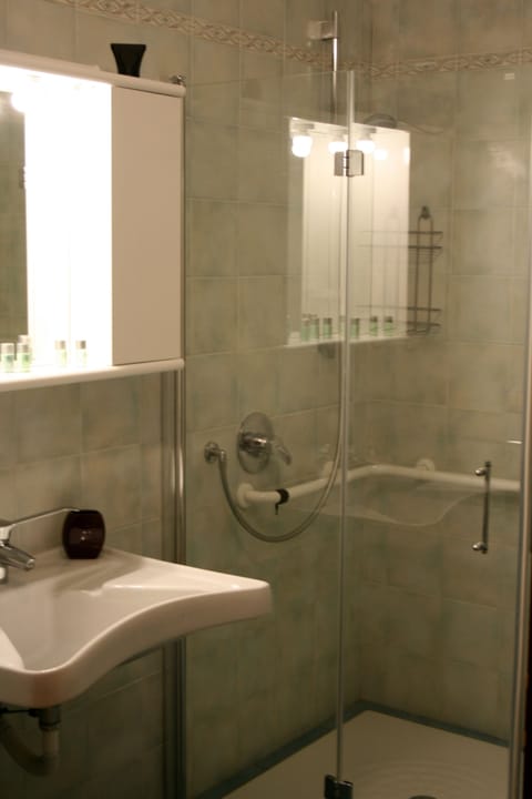 Family Room, Kitchenette, Garden View | Bathroom | Shower, free toiletries, hair dryer, bidet