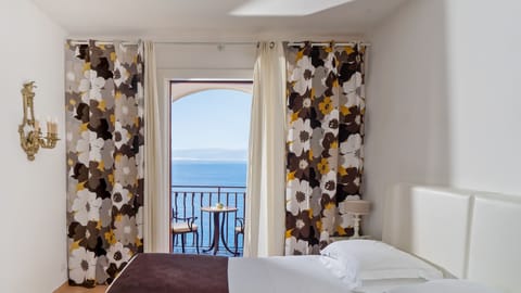 Junior Suite, Balcony, Sea View | Premium bedding, memory foam beds, minibar, in-room safe