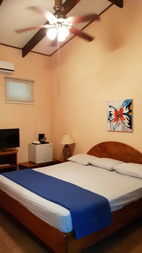 Standard Double Room, Garden View, Ground Floor | In-room safe, blackout drapes, free WiFi, bed sheets