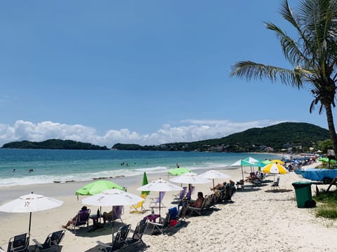 Beach nearby, white sand, sun loungers, beach umbrellas