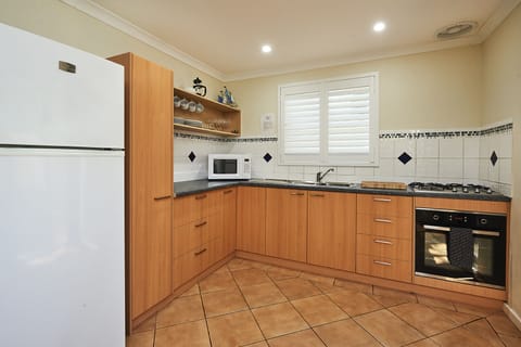 Double Storey 2 Bedroom Apartment, at 8 Festing Street | Private kitchen | Mini-fridge, microwave, stovetop, coffee/tea maker