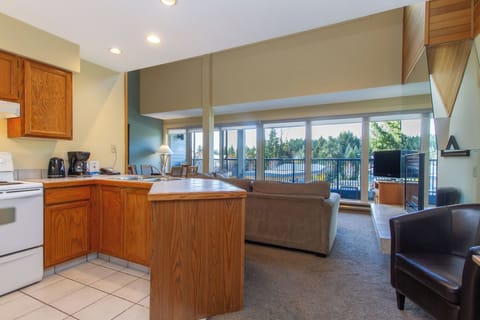 Condo, 1 Bedroom + Loft, Hot Tub (Unit 203) | Private kitchen | Fridge, microwave, oven, stovetop