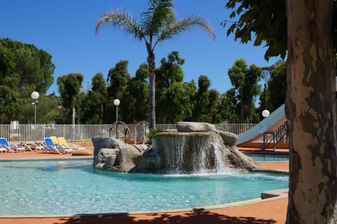 Outdoor pool, open 9:00 AM to 8:00 PM, sun loungers