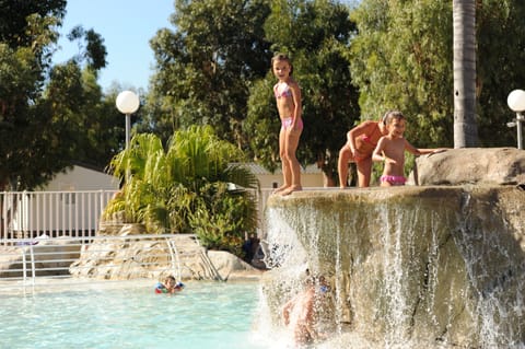 Outdoor pool, open 9:00 AM to 8:00 PM, sun loungers