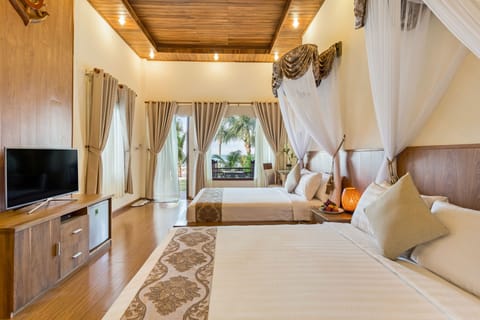 Family Double or Twin Room, Beachfront | Living room | 40-inch LED TV with satellite channels, TV, Netflix