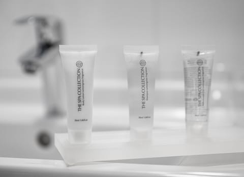 Family Room | Bathroom | Shower, designer toiletries, hair dryer, towels