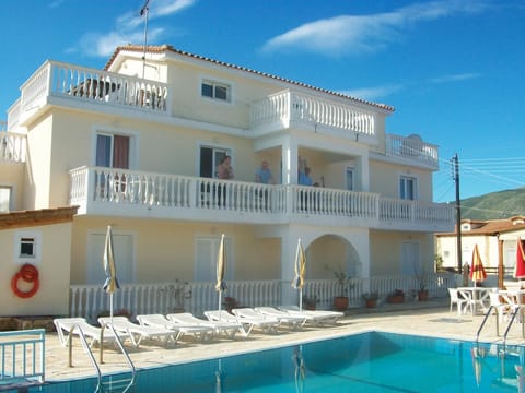 Outdoor pool, pool umbrellas, sun loungers