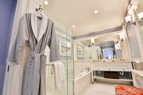 Separate tub and shower, designer toiletries, hair dryer, bathrobes