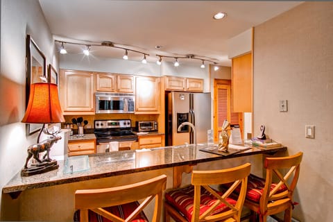 Apartment, Multiple Beds (Two-Bedroom Apartment) | Private kitchen | Full-size fridge, microwave, oven, stovetop