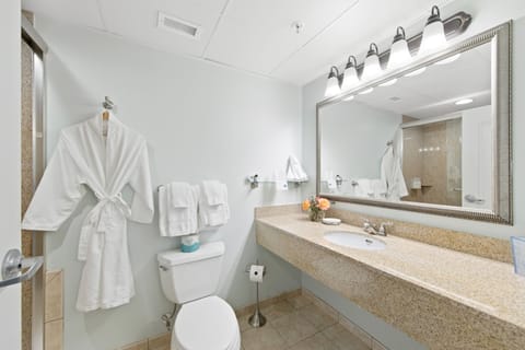 Combined shower/tub, designer toiletries, hair dryer, bathrobes