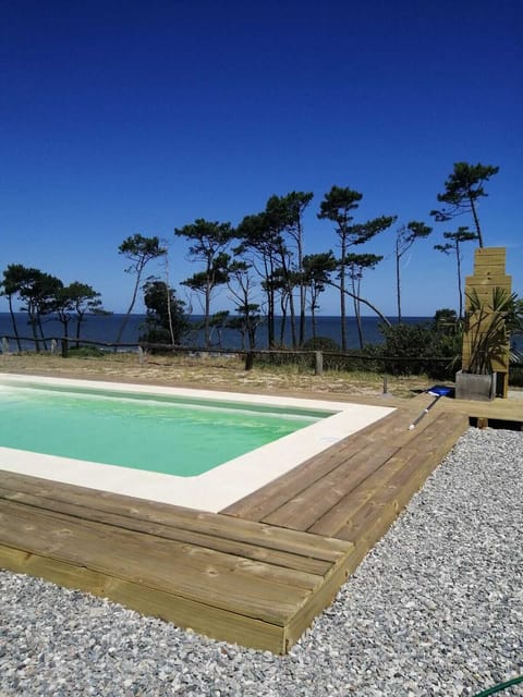 Seasonal outdoor pool, pool umbrellas