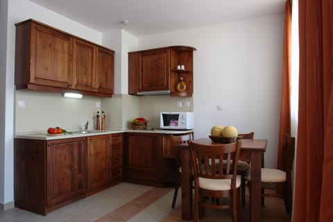 Apartment, 1 Bedroom, Balcony | Private kitchen | Full-size fridge, microwave, stovetop, electric kettle