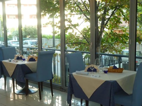 Breakfast, lunch, dinner served; local cuisine 