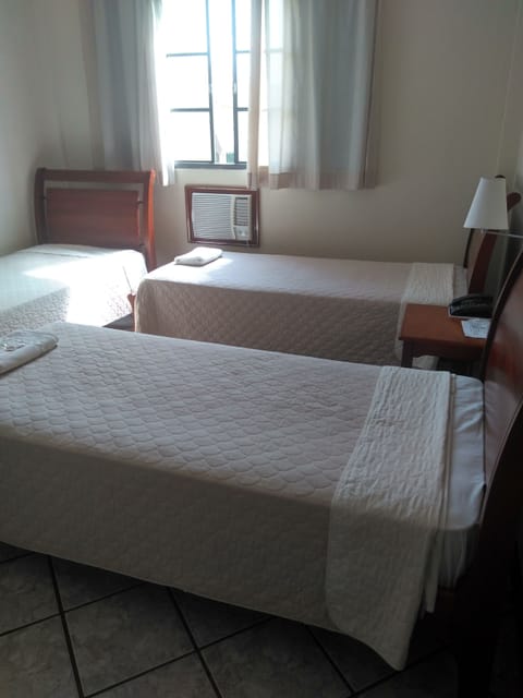 Deluxe Triple Room | Minibar, desk, cribs/infant beds, free WiFi