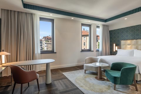 Premium bedding, down comforters, minibar, in-room safe